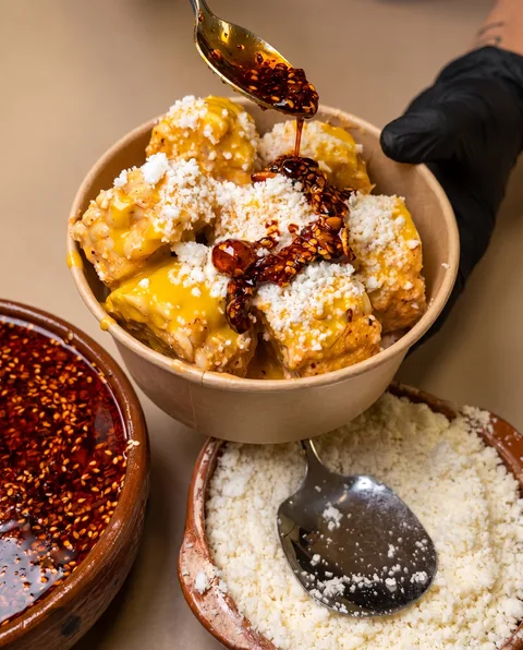 Elotitos Macha with corn, cheese and spicy salsa